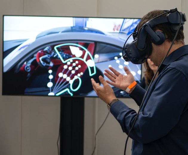 A person playing one of the top five virtual games wearing his vr game headset